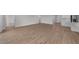 Expansive living area adjacent to the kitchen, showcasing continuous tile flooring throughout the home at 1797 Pepper Grass Dr, North Port, FL 34289