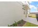 Cozy back patio area with a view of the landscaped yard and neighboring properties at 2019 Wild Heron Ct, Valrico, FL 33596