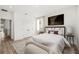 Bedroom with a cozy armchair, comfortable bed, and stylish decorations at 2019 Wild Heron Ct, Valrico, FL 33596