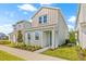 Charming two-story home with a well-manicured lawn and inviting entrance at 2019 Wild Heron Ct, Valrico, FL 33596