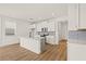 Modern kitchen featuring a large island, stainless steel appliances, and ample cabinet space at 2019 Wild Heron Ct, Valrico, FL 33596
