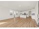 Spacious open-concept living room with wood floors and abundant natural light at 2019 Wild Heron Ct, Valrico, FL 33596