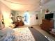 Inviting bedroom with ample space, lots of light, and closet for ample storage at 2101 Sunset Point Rd # 205, Clearwater, FL 33765