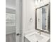 Elegant bathroom features a modern vanity, a framed mirror and recessed lighting at 2123 1St N Ave, St Petersburg, FL 33713