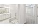 Elegant bathroom featuring a glass-enclosed shower, vanity and marble flooring at 2123 1St N Ave, St Petersburg, FL 33713
