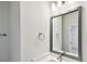 Clean, bright bathroom with a modern square mirror, white marble countertop, and brushed nickel faucet at 2123 1St N Ave, St Petersburg, FL 33713