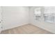 Bright, spacious bedroom with neutral carpet and plenty of natural light at 2123 1St N Ave, St Petersburg, FL 33713
