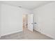 Bright bedroom featuring neutral carpet and double doors at 2123 1St N Ave, St Petersburg, FL 33713