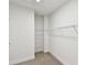 Walk-in closet with carpet and wire shelving at 2123 1St N Ave, St Petersburg, FL 33713
