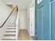 Inviting entryway features a staircase and modern finishes at 2123 1St N Ave, St Petersburg, FL 33713