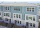Charming townhome exterior showcases a two-story design with inviting curb appeal at 2123 1St N Ave, St Petersburg, FL 33713