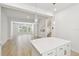 Bright open-concept living space with big windows and hardwood floors at 2123 1St N Ave, St Petersburg, FL 33713