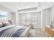Serene main bedroom with tray ceiling, ample natural light, and a cozy seating area at 2123 1St N Ave, St Petersburg, FL 33713