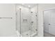 Marble tiled shower with glass door and a built-in niche at 2123 1St N Ave, St Petersburg, FL 33713