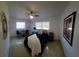 Bright bedroom boasts ample natural light and a cozy seating area at 2204 Euclid S Cir, Clearwater, FL 33764