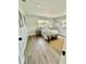 Serene bedroom showcasing a stylish bed, trendy decor, and ample natural light at 2204 Euclid S Cir, Clearwater, FL 33764