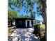 Charming home featuring a modern design, carport, and beautiful landscaping at 2204 Euclid S Cir, Clearwater, FL 33764