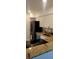 Close up of a well-equipped kitchen with granite countertops, stainless steel appliances and white cabinets at 2204 Euclid S Cir, Clearwater, FL 33764