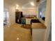 Well-lit kitchen with white cabinets, stainless steel appliances, and a sleek countertop at 2204 Euclid S Cir, Clearwater, FL 33764