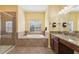 Bathroom featuring both tub and shower with granite countertops at 2417 Cumberland Cliff Dr, Ruskin, FL 33570