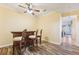 A cozy dining room/bar area with a wooden bar and 3 upholstered bar stools at 2417 Cumberland Cliff Dr, Ruskin, FL 33570
