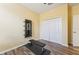 Spacious workout room with exercise machine, wood-look floors, and plenty of closet space at 2417 Cumberland Cliff Dr, Ruskin, FL 33570