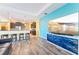 Open-concept living room and kitchen area with stylish design and modern appliances at 2417 Cumberland Cliff Dr, Ruskin, FL 33570