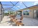 Spacious outdoor patio with elegant brick flooring, comfortable seating and an inviting ambiance for entertaining guests at 2417 Cumberland Cliff Dr, Ruskin, FL 33570