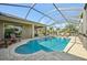 Enjoy your private in-ground pool and screened lanai with comfortable seating area at 2417 Cumberland Cliff Dr, Ruskin, FL 33570