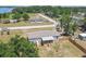 Beautiful elevated view of the house with a fenced backyard and covered porch, perfect for relaxing and entertaining outdoors at 25126 Huston St, Brooksville, FL 34601