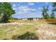 Newly renovated home featuring a spacious backyard and a brand new fence at 25126 Huston St, Brooksville, FL 34601