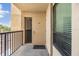 Private balcony area with outdoor access overlooking the surrounding property at 2617 Cove Cay Dr # 401, Clearwater, FL 33760