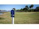 Scenic golf course view with lush green fairway and pond at 2617 Cove Cay Dr # 401, Clearwater, FL 33760
