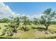 Beautifully landscaped grounds with mature trees and views of the bay create a serene outdoor environment at 2617 Cove Cay Dr # 401, Clearwater, FL 33760