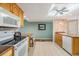 Bright kitchen features wooden cabinets, countertops, and modern appliances at 2617 Cove Cay Dr # 401, Clearwater, FL 33760