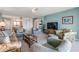 Cozy living room showcasing an open design, and easy access to kitchen and outdoor views at 2617 Cove Cay Dr # 401, Clearwater, FL 33760