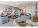 Inviting living room with comfortable seating and easy access to the kitchen at 2617 Cove Cay Dr # 401, Clearwater, FL 33760
