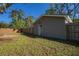 Backyard with a utility shed, and a wood fence offering a private outdoor space at 267 Broad St, Brooksville, FL 34604