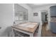 Cozy dining area with a table, four chairs, and natural light from a window at 267 Broad St, Brooksville, FL 34604