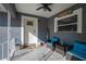 Inviting front porch with seating area, welcome mat and cheerful decor, offering a cozy entrance to the home at 267 Broad St, Brooksville, FL 34604