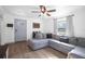 Inviting living room featuring modern decor and a gray sofa at 267 Broad St, Brooksville, FL 34604