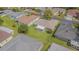 Aerial view of the home highlighting its backyard, screened lanai, and location within a serene neighborhood at 29436 Zeller Ave, San Antonio, FL 33576