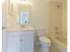 This bathroom has a shower over tub and updated white vanity at 29436 Zeller Ave, San Antonio, FL 33576