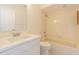 Bathroom features updated vanity and shower over tub combination at 29436 Zeller Ave, San Antonio, FL 33576