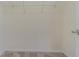 Empty walk-in closet is ready to be organized with wire shelving at 29436 Zeller Ave, San Antonio, FL 33576
