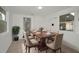 Charming dining area with seating for six around a dark wood table, perfect for Gathering gatherings at 306 S Highland Ave, Clearwater, FL 33755