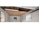 A bright garage with painted walls, two windows and overhead lighting for any project at 306 S Highland Ave, Clearwater, FL 33755