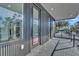 Modern balcony provides a panoramic view of the lush landscape, great for outdoor living at 3175 10Th N Ave, St Petersburg, FL 33713