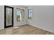 An inviting bedroom boasts bright, natural light and attractive hardwood floors at 3175 10Th N Ave, St Petersburg, FL 33713