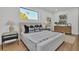 Bright bedroom features a large window, stylish furniture, and modern decor for a relaxing retreat at 3175 10Th N Ave, St Petersburg, FL 33713